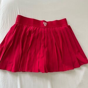 TnAction Bright pink tennis micro skirt
